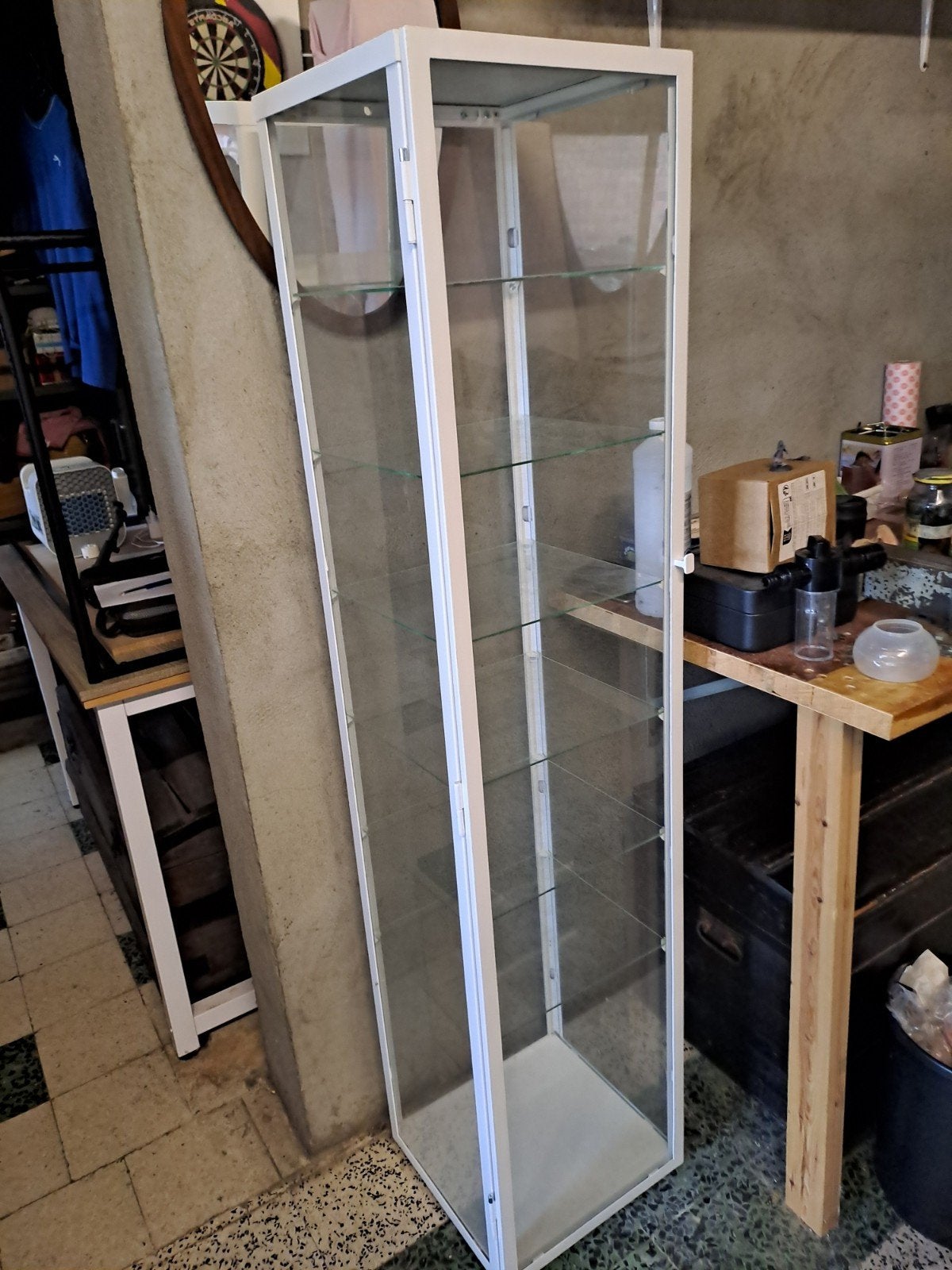 Nieuwe glazen kast, Ophalen