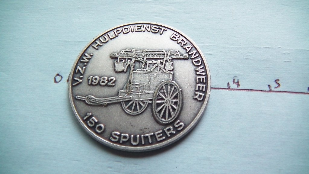 médaille putte 1982 gris, Enlèvement