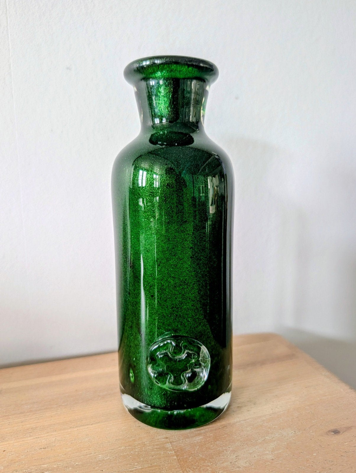 Prachtig groen vaasje, Ophalen