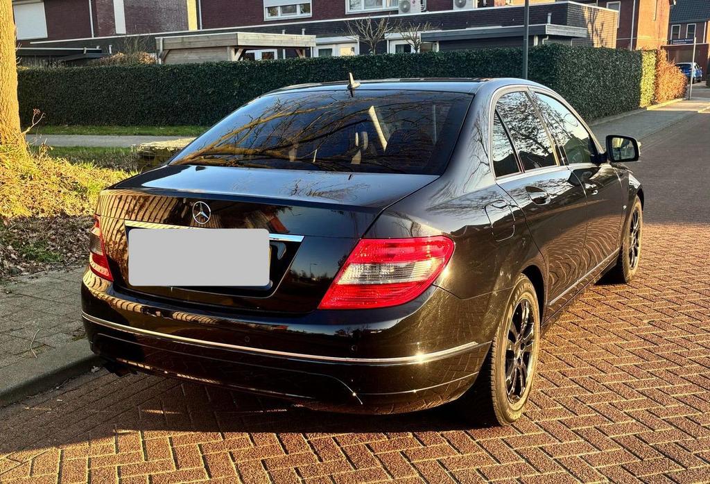 Zwarte Mercedes 180 C bouwjaar 2008, Automaat, Stof, Zwart, Zwart
