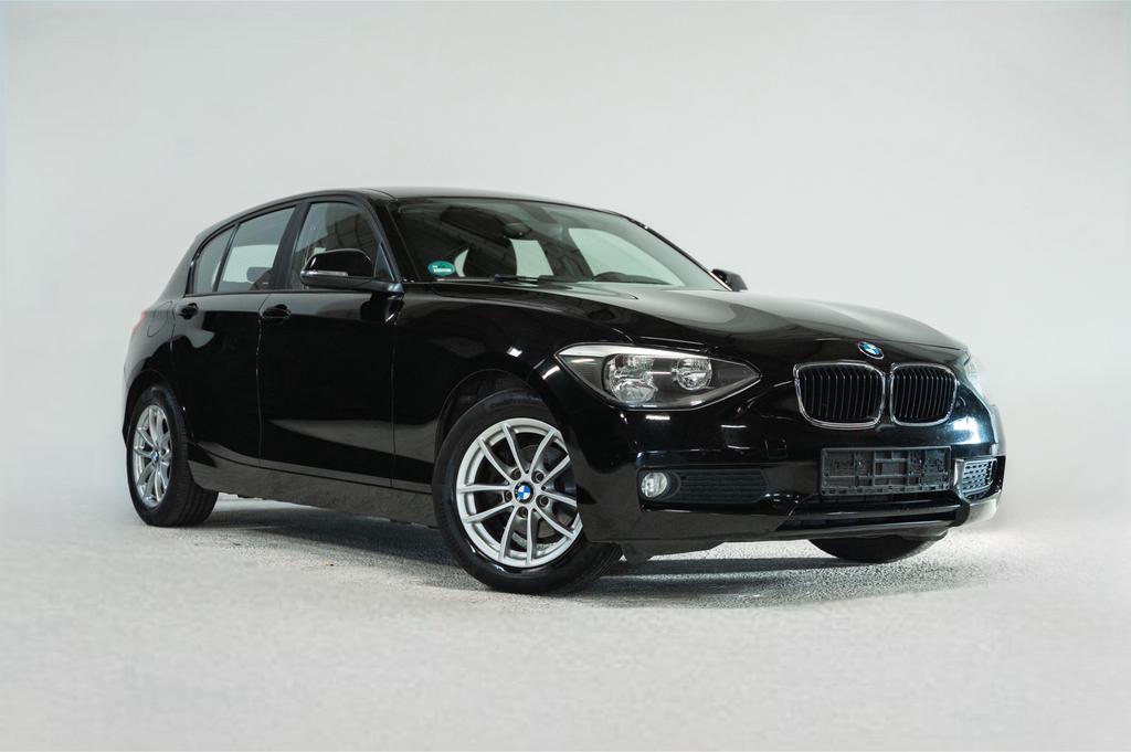 BMW 1-serie 116i Benzine 2012 Zwart, Auto's, BMW, 100 kW, Zwart, 4 cilinders, Zwart