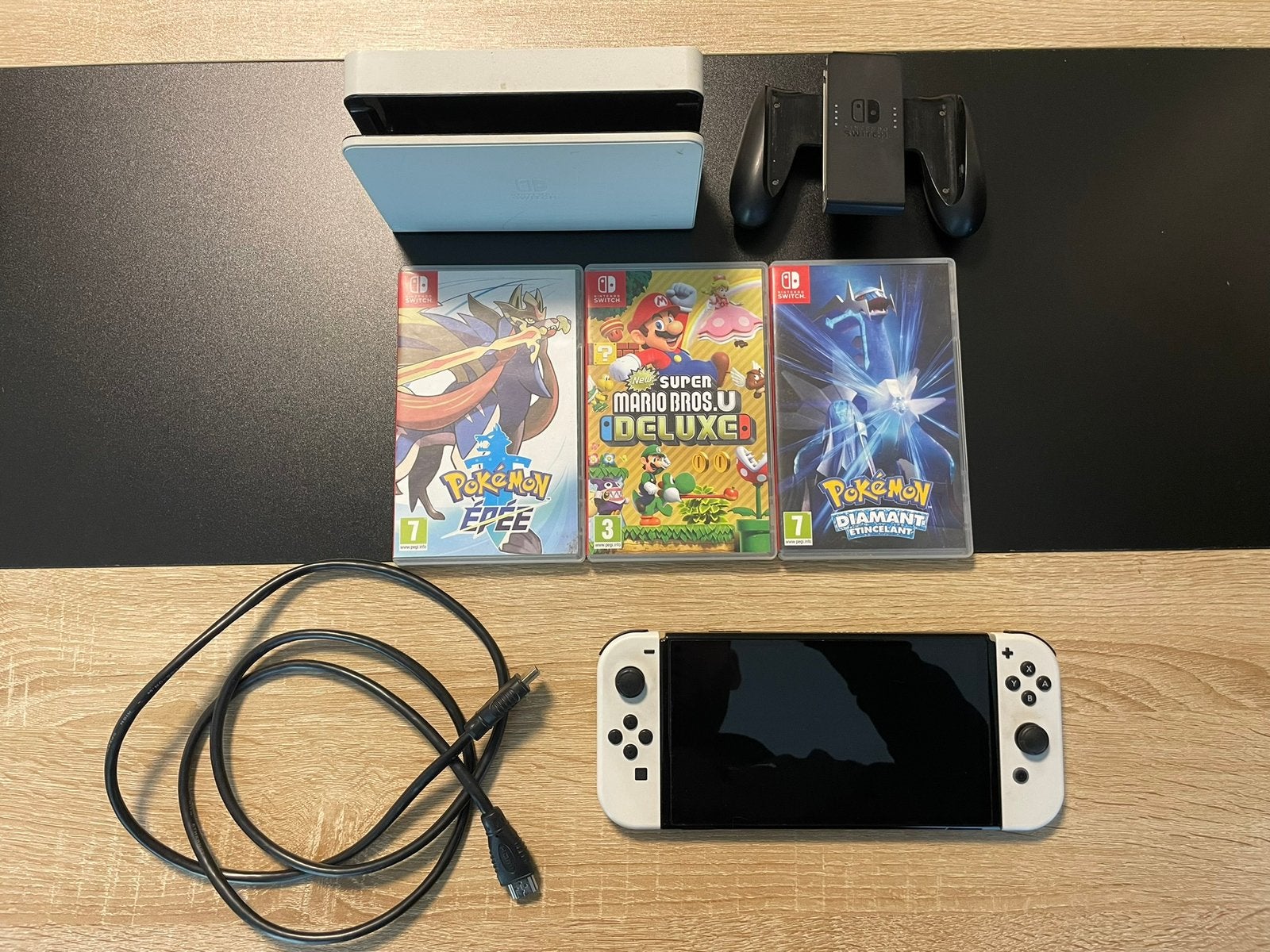 Nintendo Switch Oled + jeux, Enlèvement, Comme neuf, Switch OLED