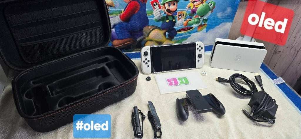OLED-switchconsole + garantie + aangepaste post, Games en Spelcomputers, Games | Nintendo Switch, Ophalen of Verzenden, Zo goed als nieuw
