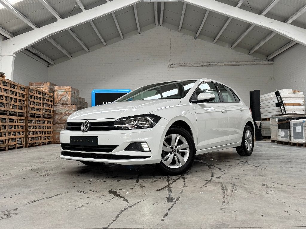 2019 Volkswagen Polo 1.0 TSI Comfortline CARPLAY / GARANTIE, Auto's, Voorwielaandrijving, Parkeersensor, Wit, Bedrijf