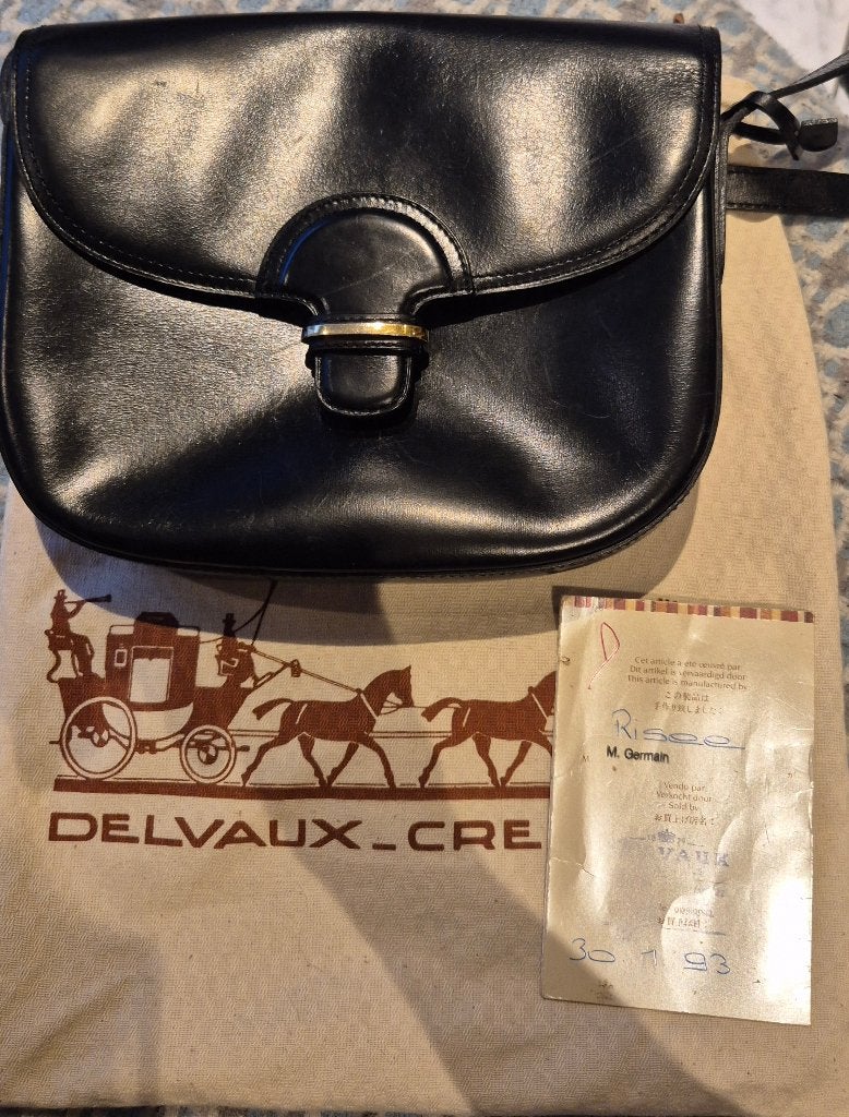 Delvaux schoudertas, Enlèvement, Sac à main
