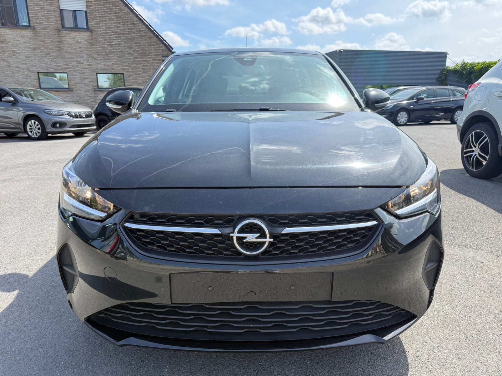 Opel Corsa 1.2i/9.500 + BTW/CARPLAY/STUURVERWARMING/CAMERA, Auto's, Opel, Voorwielaandrijving, Stof, 1199 cc, Zwart