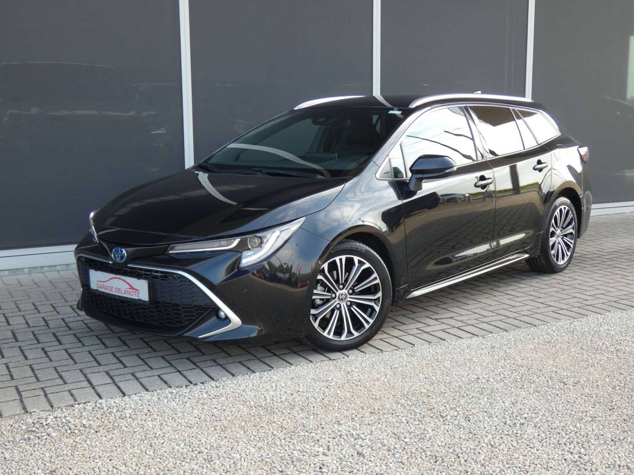 Toyota Corolla 1.8 Hybrid *PREMIUM* +Sportzetels +Elektrisch, Auto's, Gebruikt, 4 cilinders, Corolla, Zwart