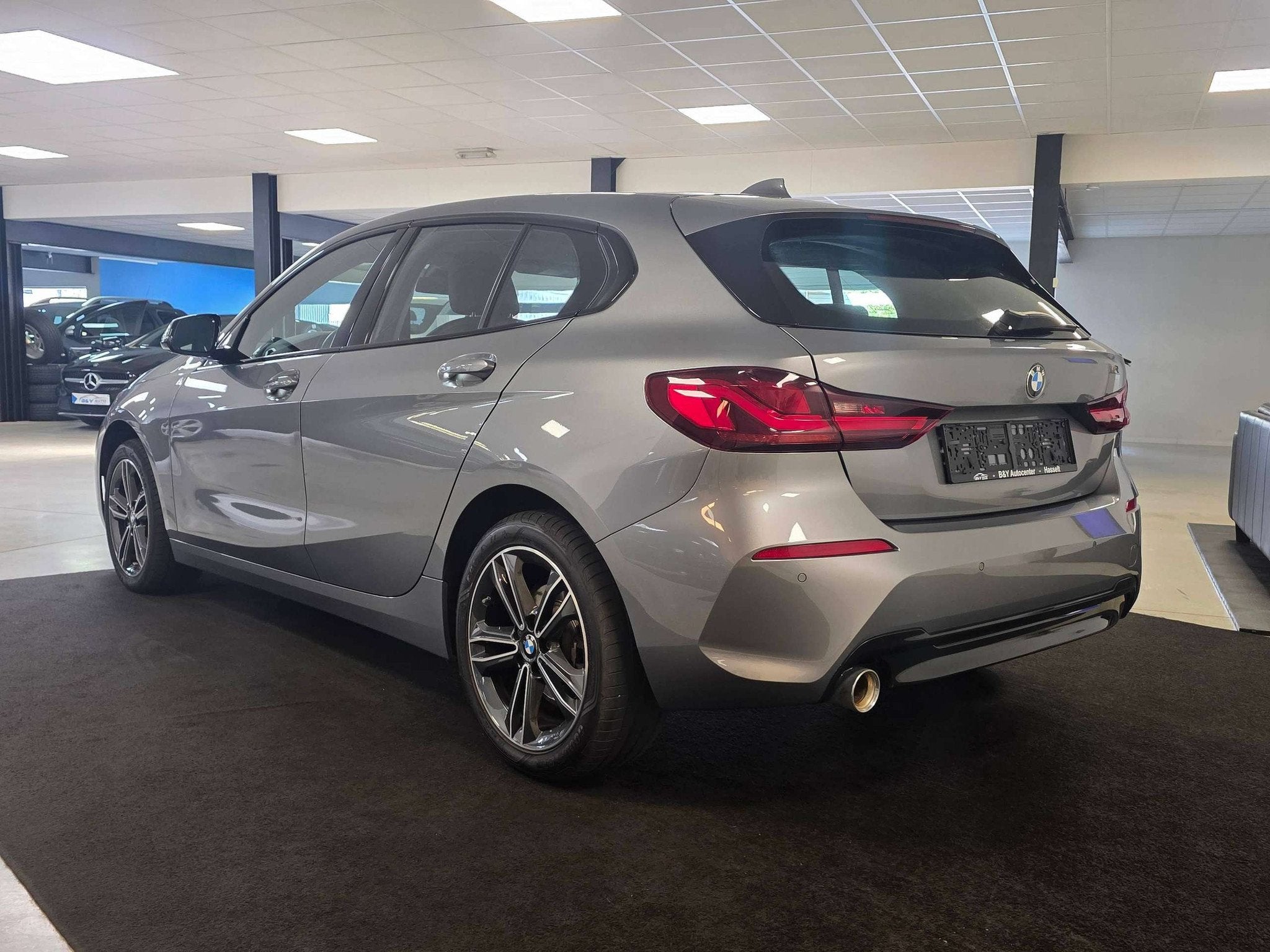 BMW 1 Serie 116 116iA OPF Sport Edition 3jaar BMW garantie, Auto's, 1 Reeks, Gebruikt, Zwart, 5 deurs