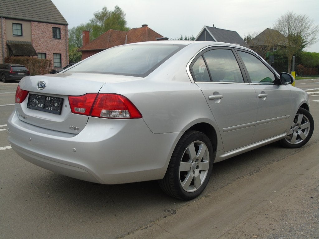 Kia Magentis 2.0 CRDI *06/2010 *Ohboekje *Airco*AUTOMAAT, Autos, Kia, Argent ou Gris, Achat, Entreprise, Magentis