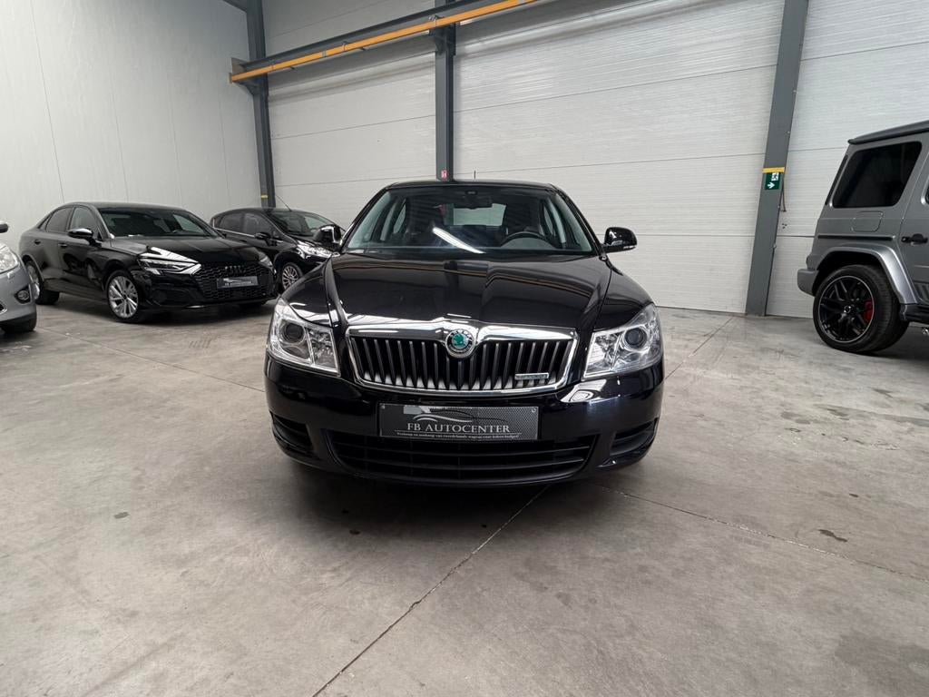 Skoda Octavia 1.6 TDI (2011) — Seulement 81 000 km —, Autos, Euro 5, Entreprise, Noir, 5 portes