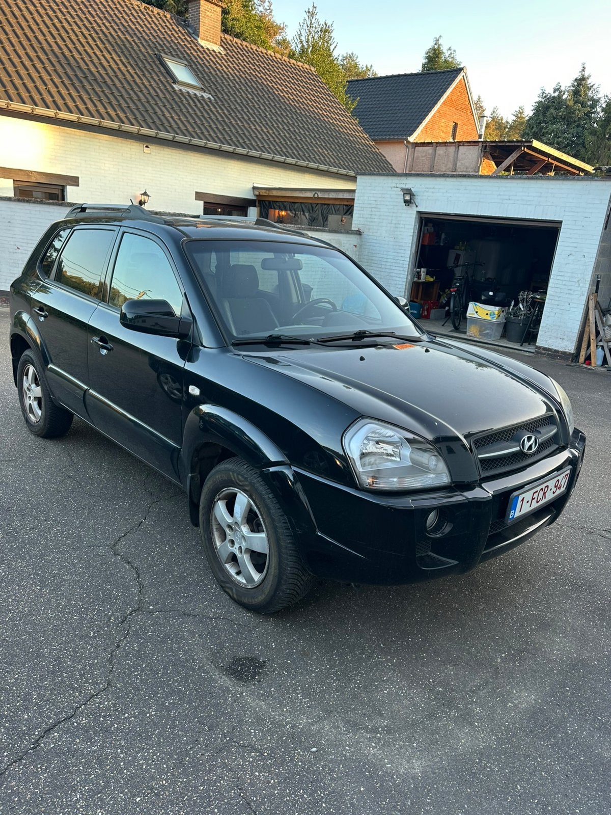 Hyundai Tucson 2.0CRDI Automaat— GEKEURD, Auto's, Elektrische ramen, Zwart, Leder en Stof, Zwart