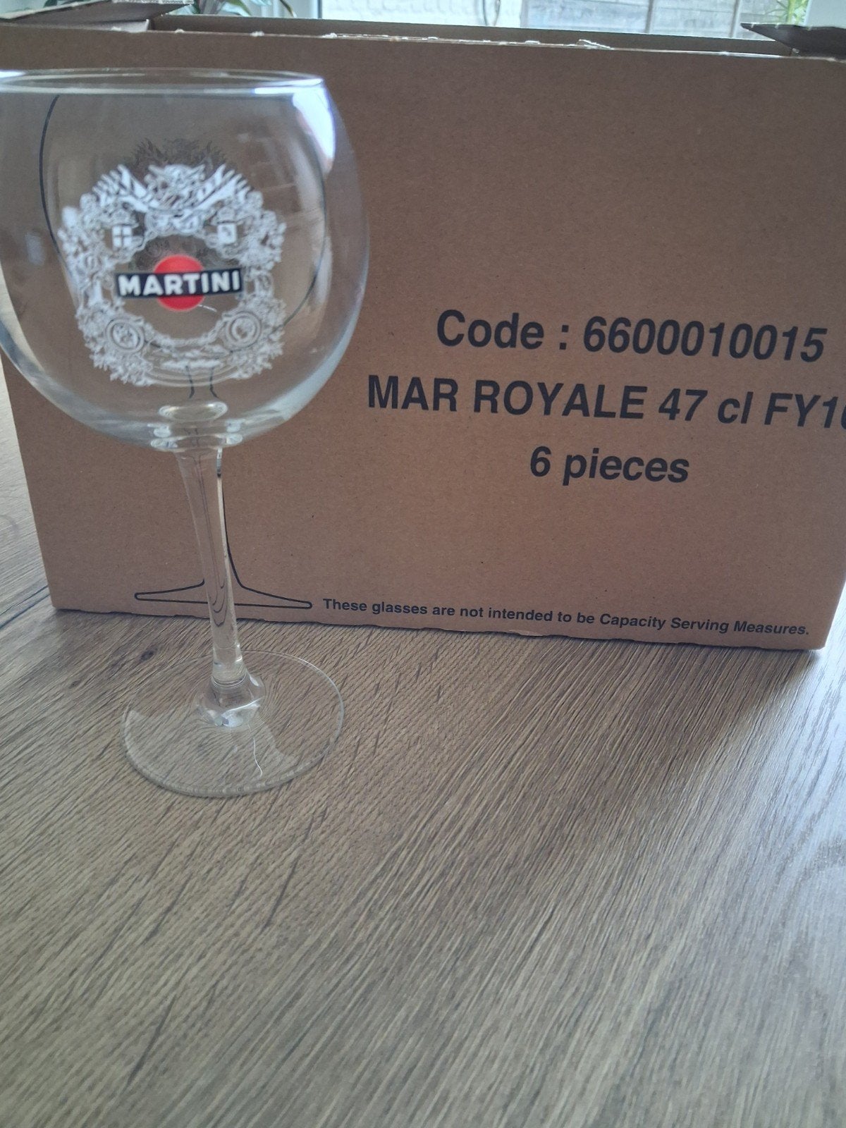 Martini glazen te koop, Ophalen