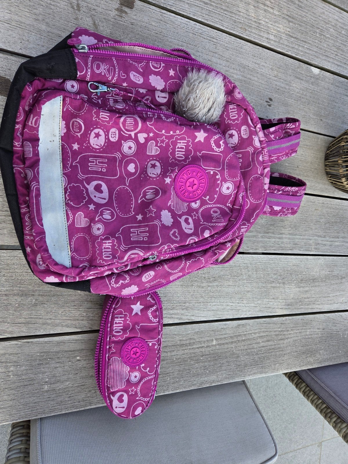 Schooltas kipling, Ophalen