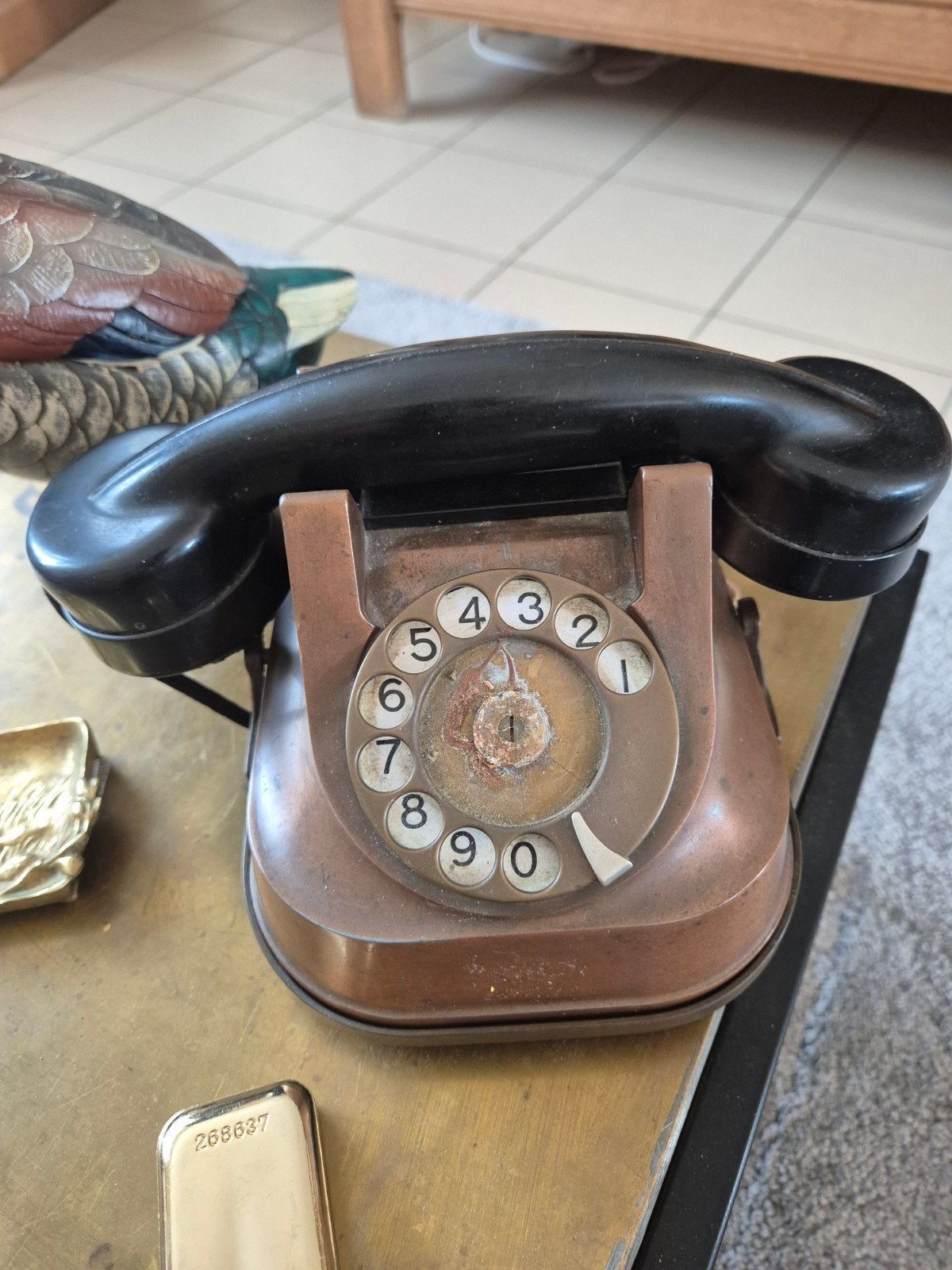 Antieke koper telefoon, Ophalen