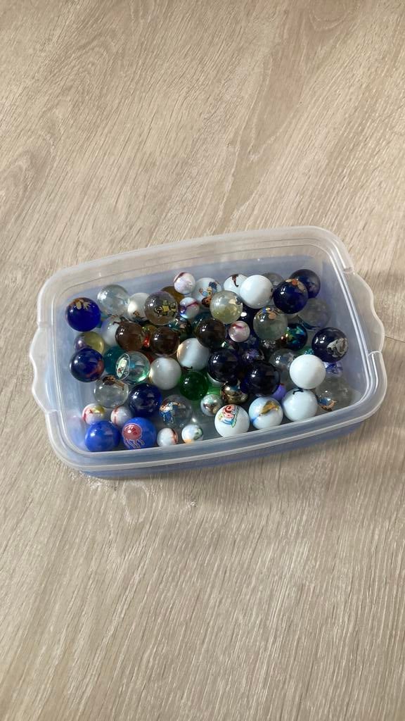 Knikkers met figuurtjes, Ophalen, Gebruikt