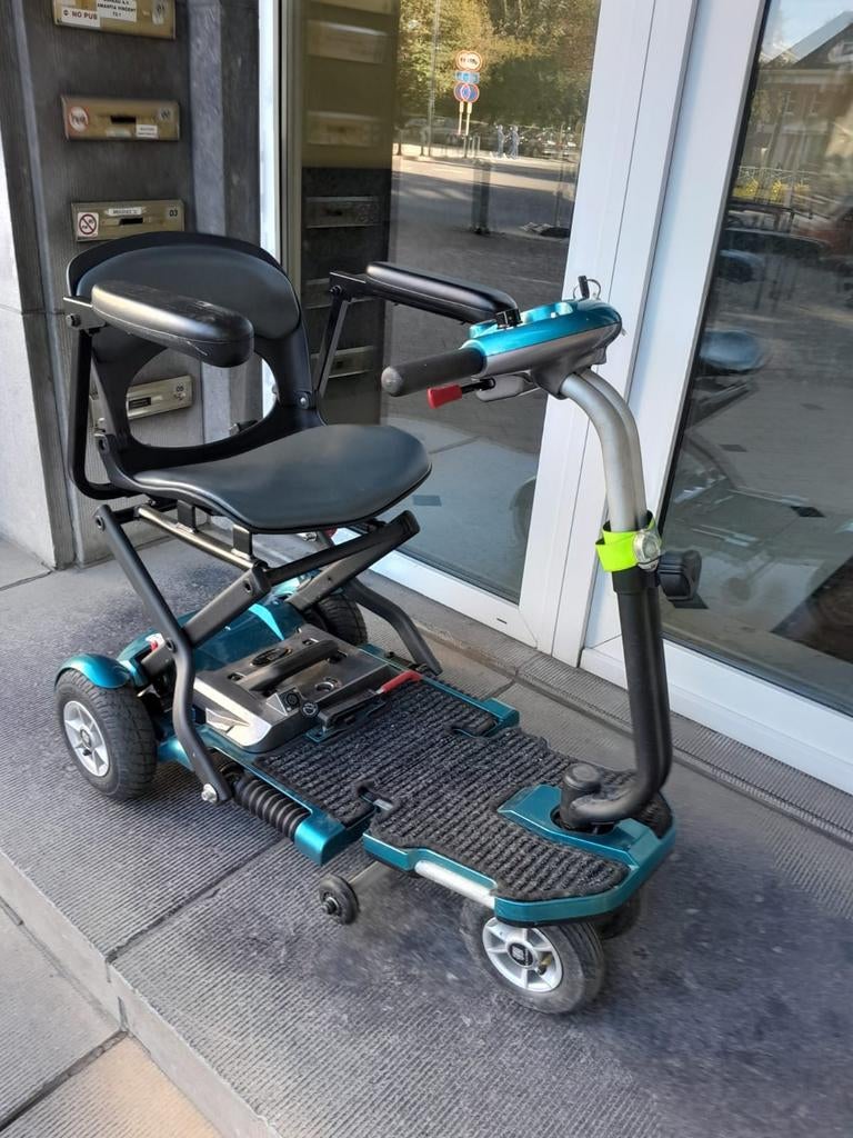 Chaise roulante électrique batterie a changer