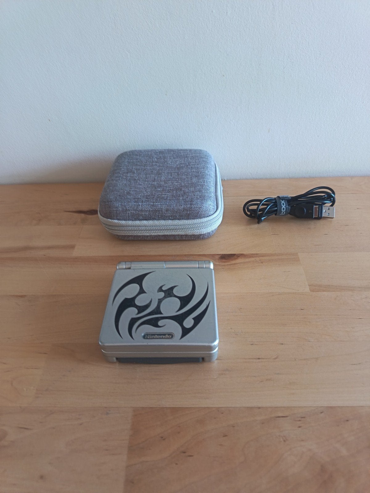 Nintendo Game Boy Advance SP Édition Tribal AGS-001, Enlèvement