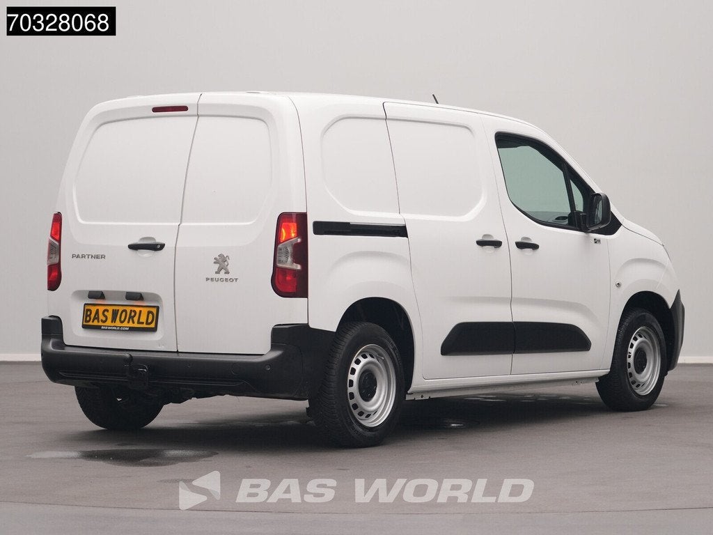 Peugeot Partner 110pk Benzine L1H1 Trekhaak Navi Airco Cruis, Auto's, Multifunctioneel stuurwiel, Stof, Gebruikt, 1199 cc