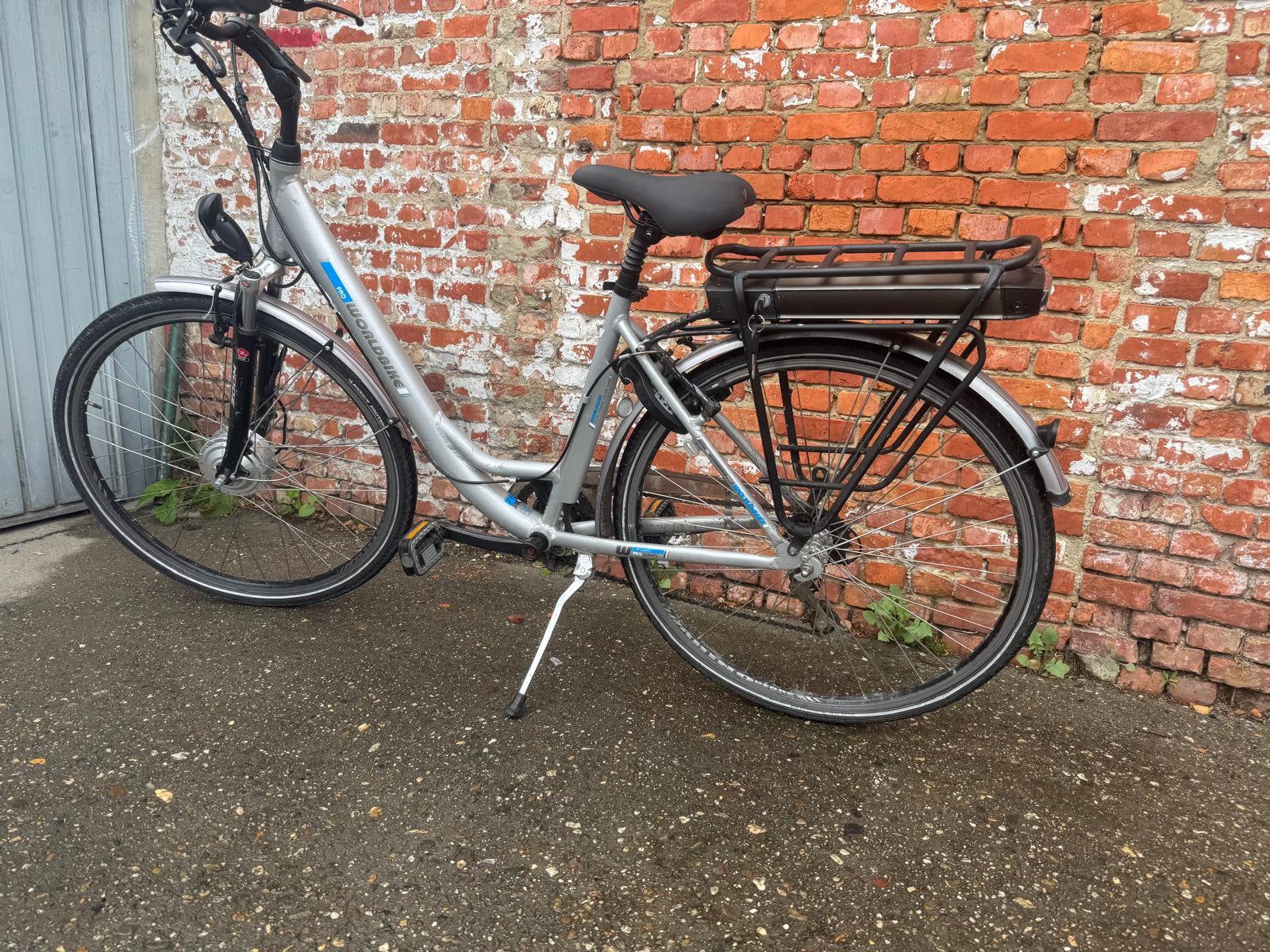 VÉLO ÉLECTRIQUE WORLDBIKE AVEC MOTEUR AVANT, Enlèvement, Comme neuf