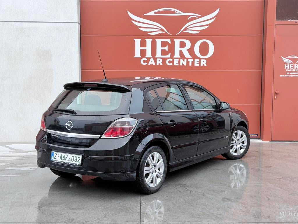 Opel Astra 1.4i OPC Line Benzine Euro 4, Auto's, Voorwielaandrijving, Zwart, 4 cilinders, Leder en Stof