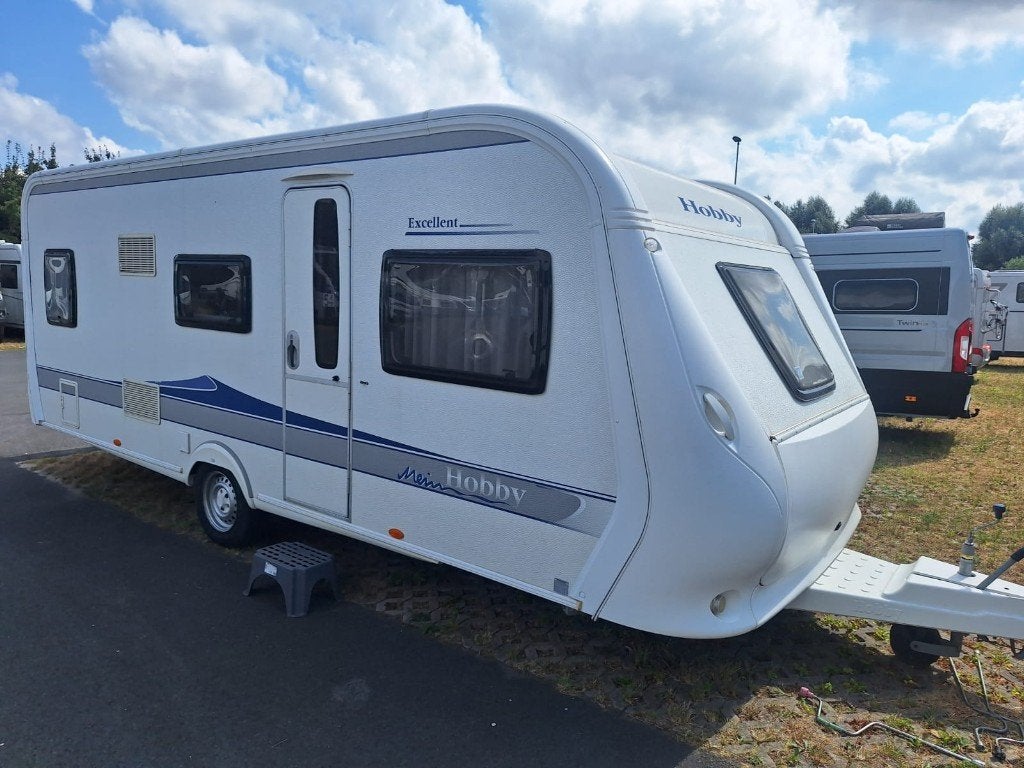 Hobby de luxe 560 "stapelbed met kinderkamer", Caravans en Kamperen, Caravans, Rondzit, Hobby, 7 tot 8 meter, Bedrijf