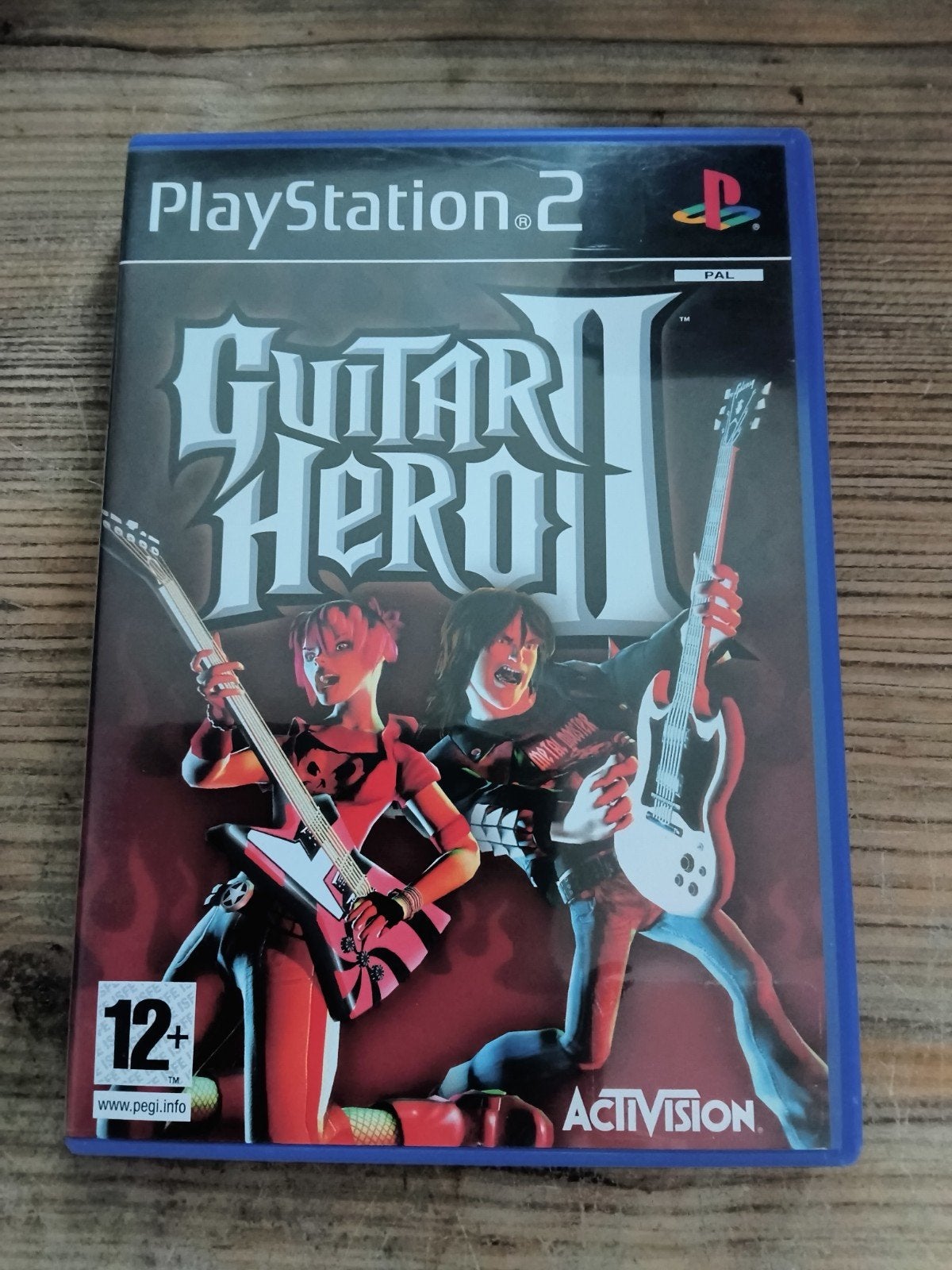 Guitar Hero II pour PlayStation 2, 2 joueurs, À partir de 12 ans, Musique, Utilisé