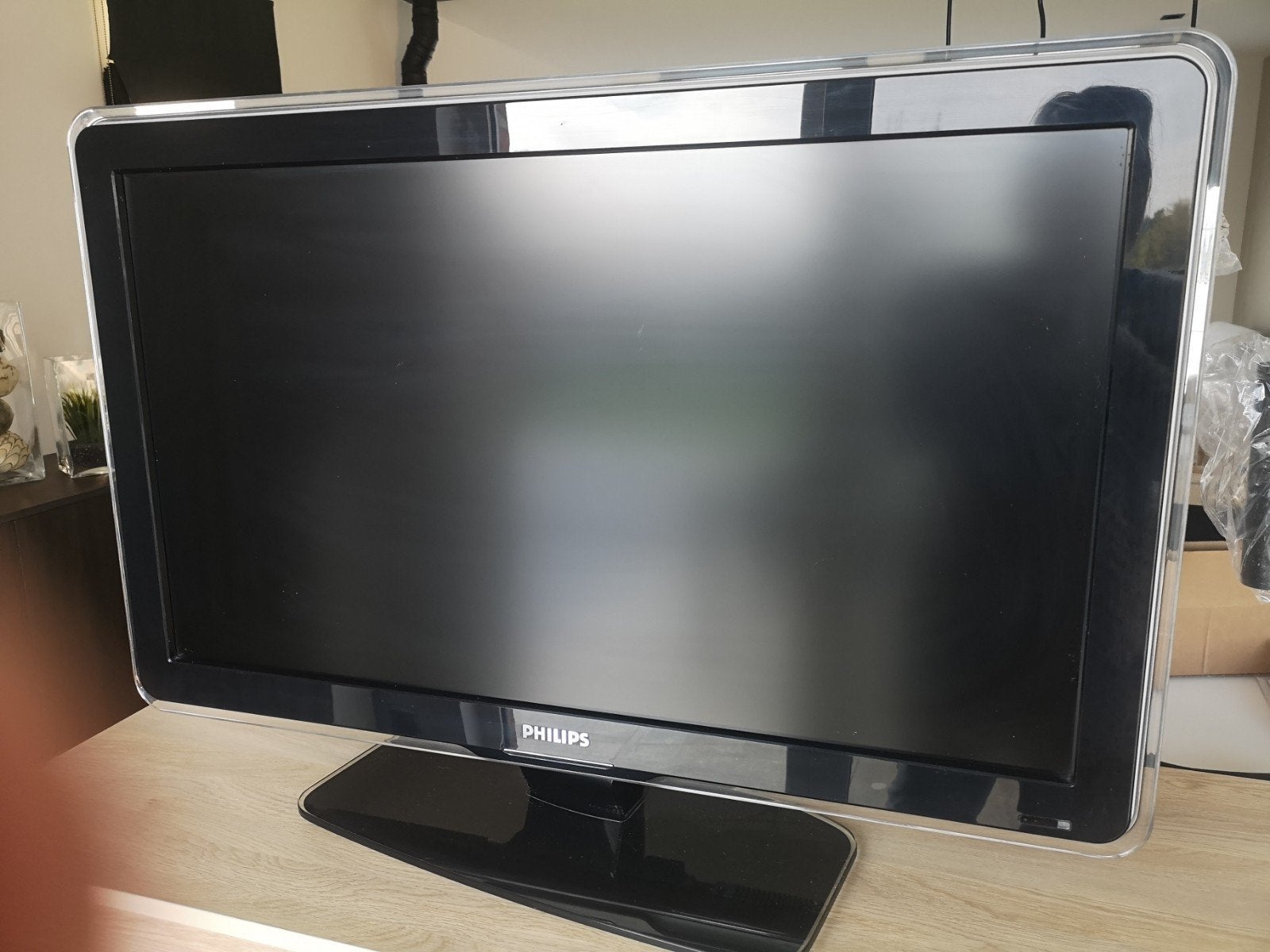 tv met Bose geluidsinstallatie, Ophalen