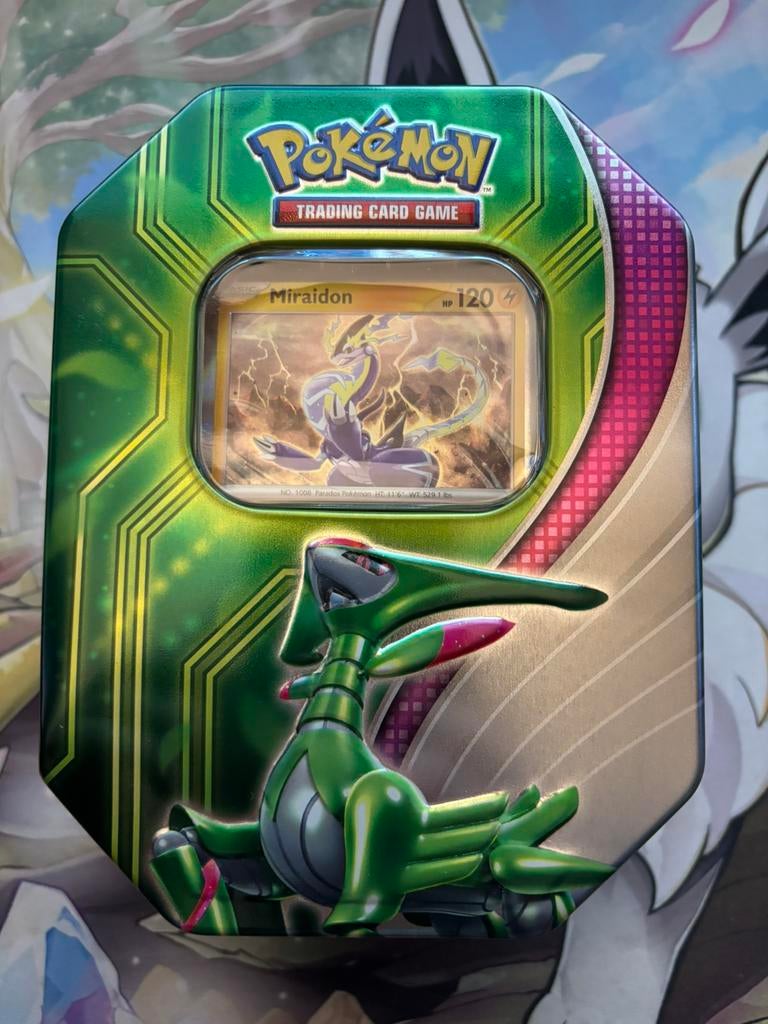 Pokémon Tins, Ophalen of Verzenden, Zo goed als nieuw, Meerdere kaarten, Foil