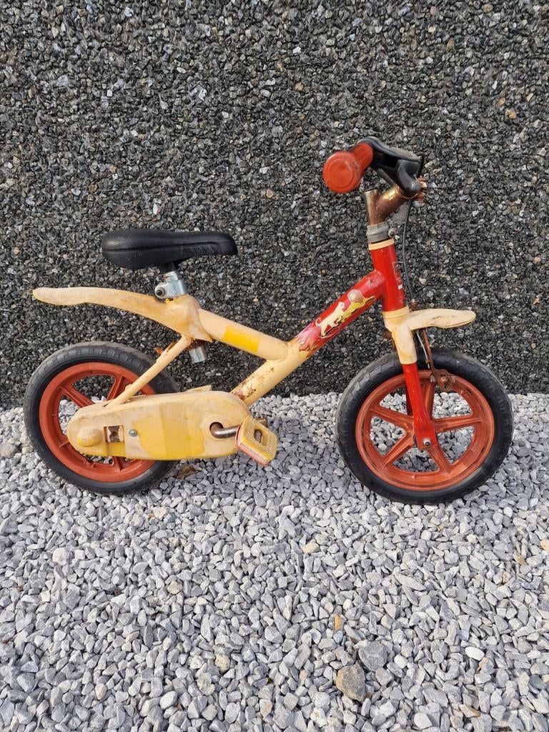 Lion King peuterfiets, Fietsen en Brommers, Ophalen, Zijwieltjes, Gebruikt, Minder dan 16 inch