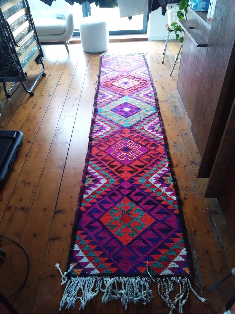 Kelim vloerkleed loper, Enlèvement