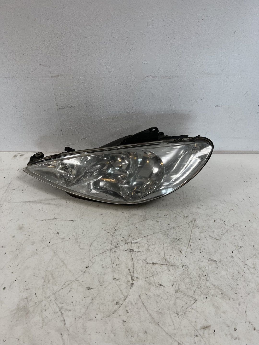 Koplamp links van een Peugeot 206, Gebruikt, -, -, Ophalen of Verzenden
