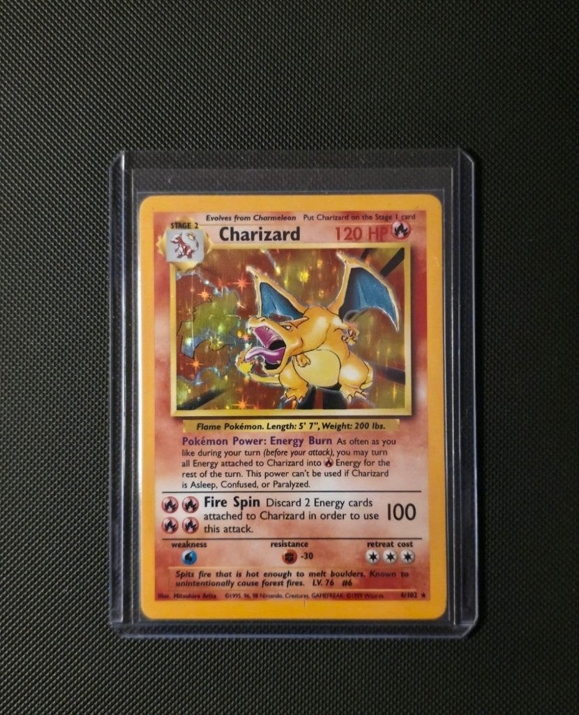 Charizard 4/102 holo base set pokemon kaart, Hobby en Vrije tijd, Ophalen of Verzenden, Zo goed als nieuw, Foil
