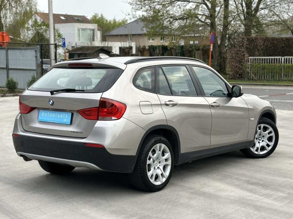 BMW X1 sDrive18d 2011 Automaat 130450km Navi Cruise Leder, Auto's, BMW, Euro 5, 1995 cc, Zwart, Beige