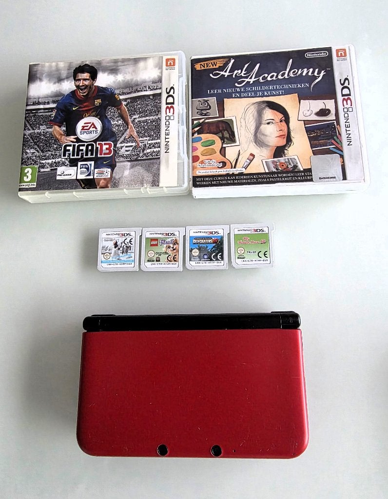 rode Nintendo 3DS XL console met 6 DS / 3DS games, Games en Spelcomputers, Spelcomputers | Nintendo 2DS en 3DS, Ophalen of Verzenden
