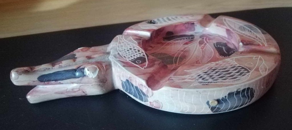 Asbak reptiel, Ophalen
