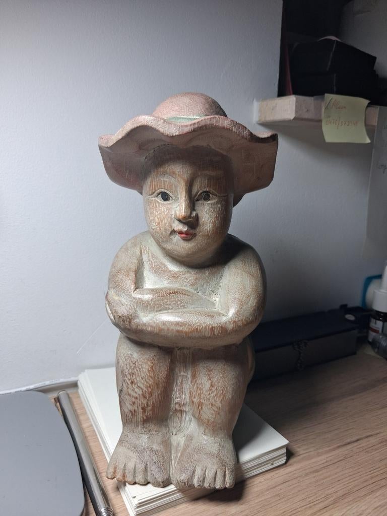 Houten chinese man., Ophalen