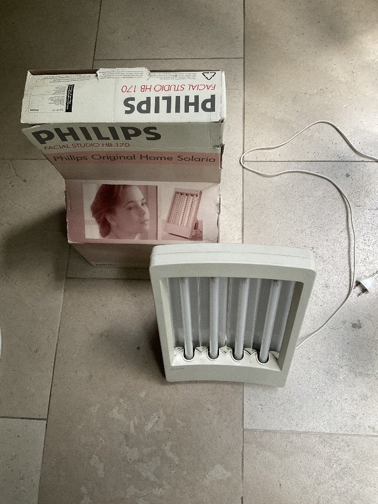 Gezichtsbruiner met timer, Ophalen
