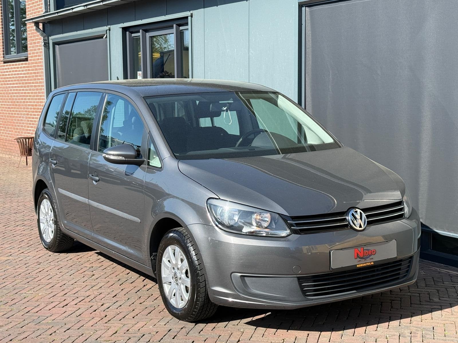 Volkswagen Touran 1.2 TSI Comfortline 7P PDC Cruise CLima De, Auto's, Euro 5, Gebruikt, 4 cilinders, 7 zetels