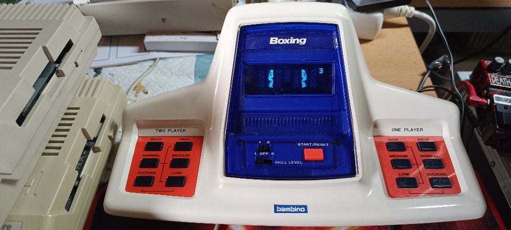 Boxing Bambino elektronisch spelhorloge, tafelblad, Games en Spelcomputers, Spelcomputers | Overige, Ophalen, Overige merken, Gebruikt