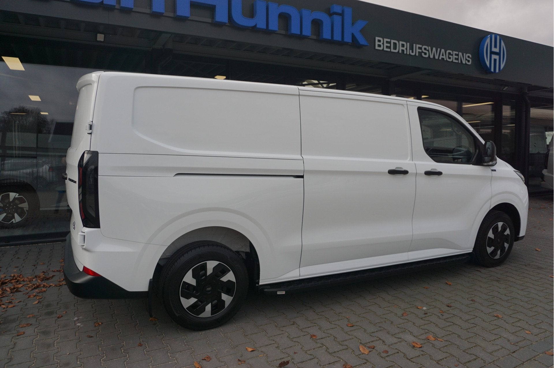 Ford Transit Custom 320L 2.5 PHEV Hybride 233PK JWR Edition!, Auto's, Gebruikt, 4 cilinders, Wit, Bedrijf