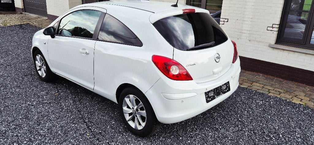 Opel Corsa 1.2i-PDC-Bleutooth-Cruise Control-Navigatie-12MGA, Auto's, Opel, Voorwielaandrijving, Euro 5, Stof, 4 cilinders