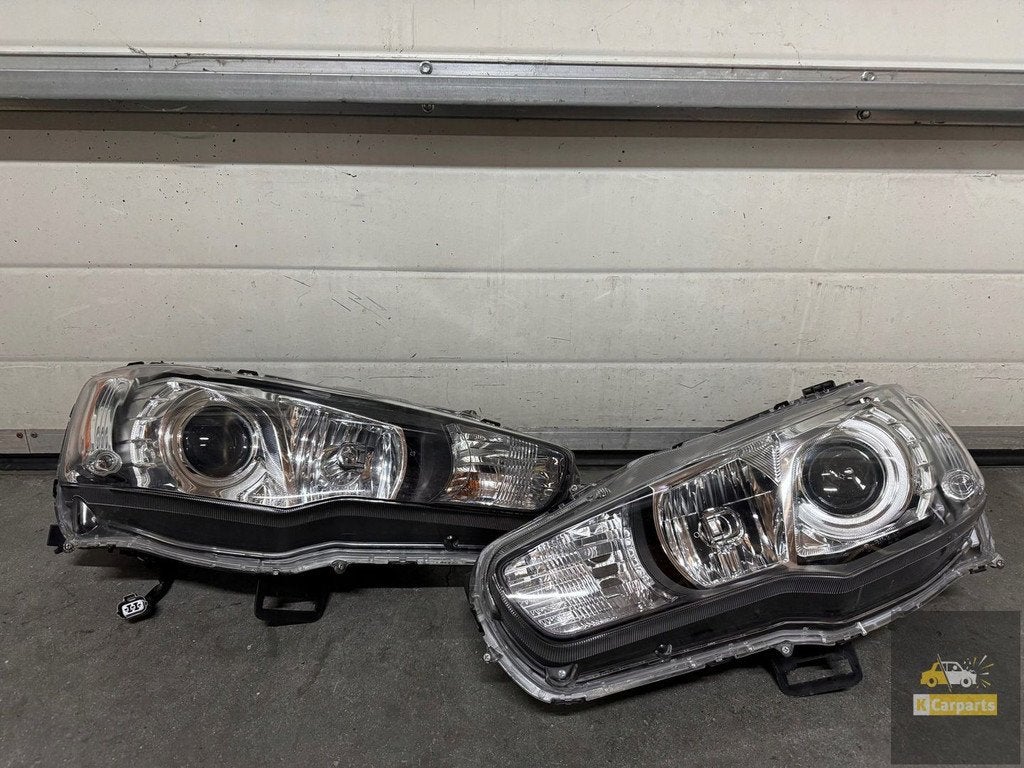 lancerxenon, Mitsubishi Lancer VIII xenonlamp links rechts, Info@mitsubishi-motors.com, Gebruikt, Mitsubishi Motors Corporation