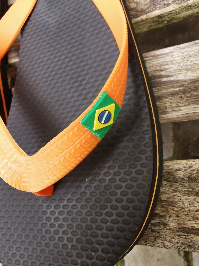 Braziliaanse slippers in oranje en zwart. 39-40., Kleding | Dames, Slippers, Brazil, Oranje, Ophalen of Verzenden