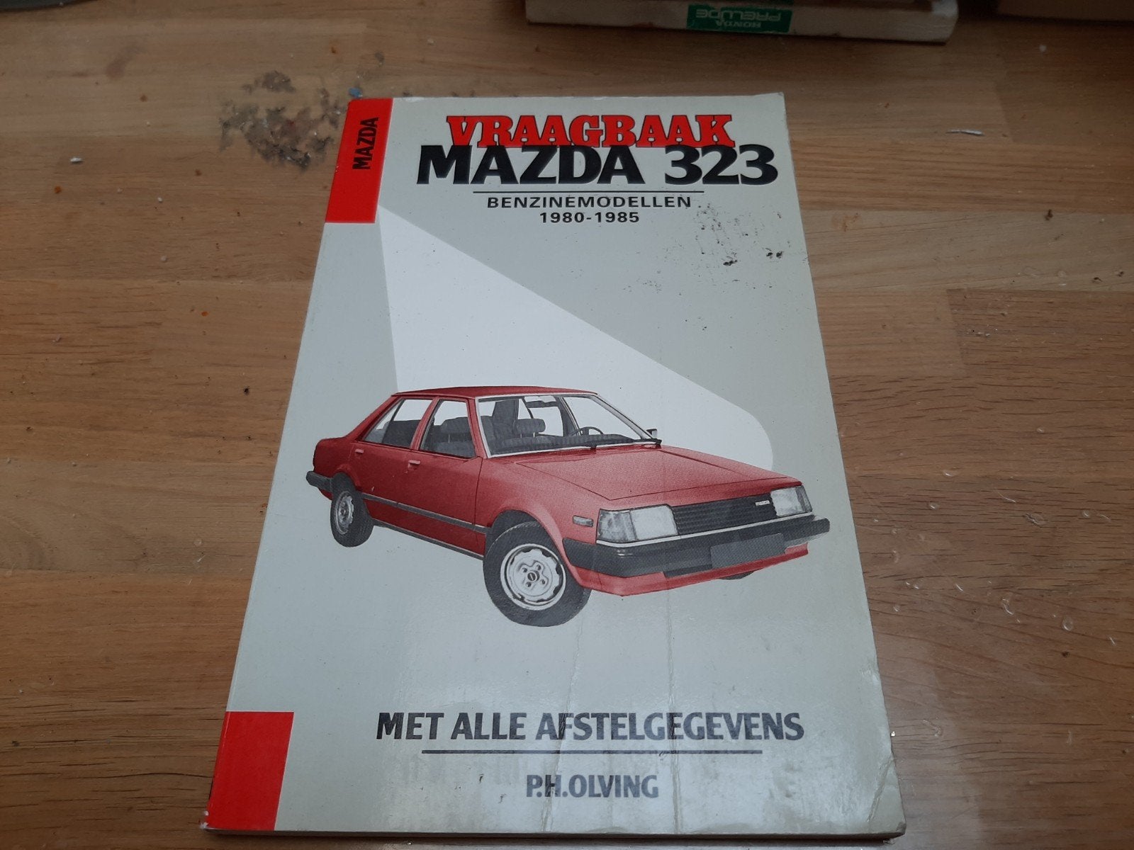 Vraagbaak Mazda 323 Benzine (1980-1985), Ophalen of Verzenden