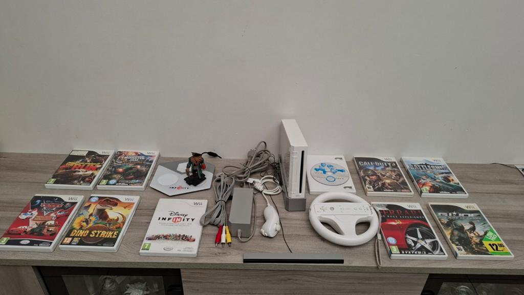 Nintendo Wii in goede staat met 10 games (Mario Kart,...), Ophalen of Verzenden