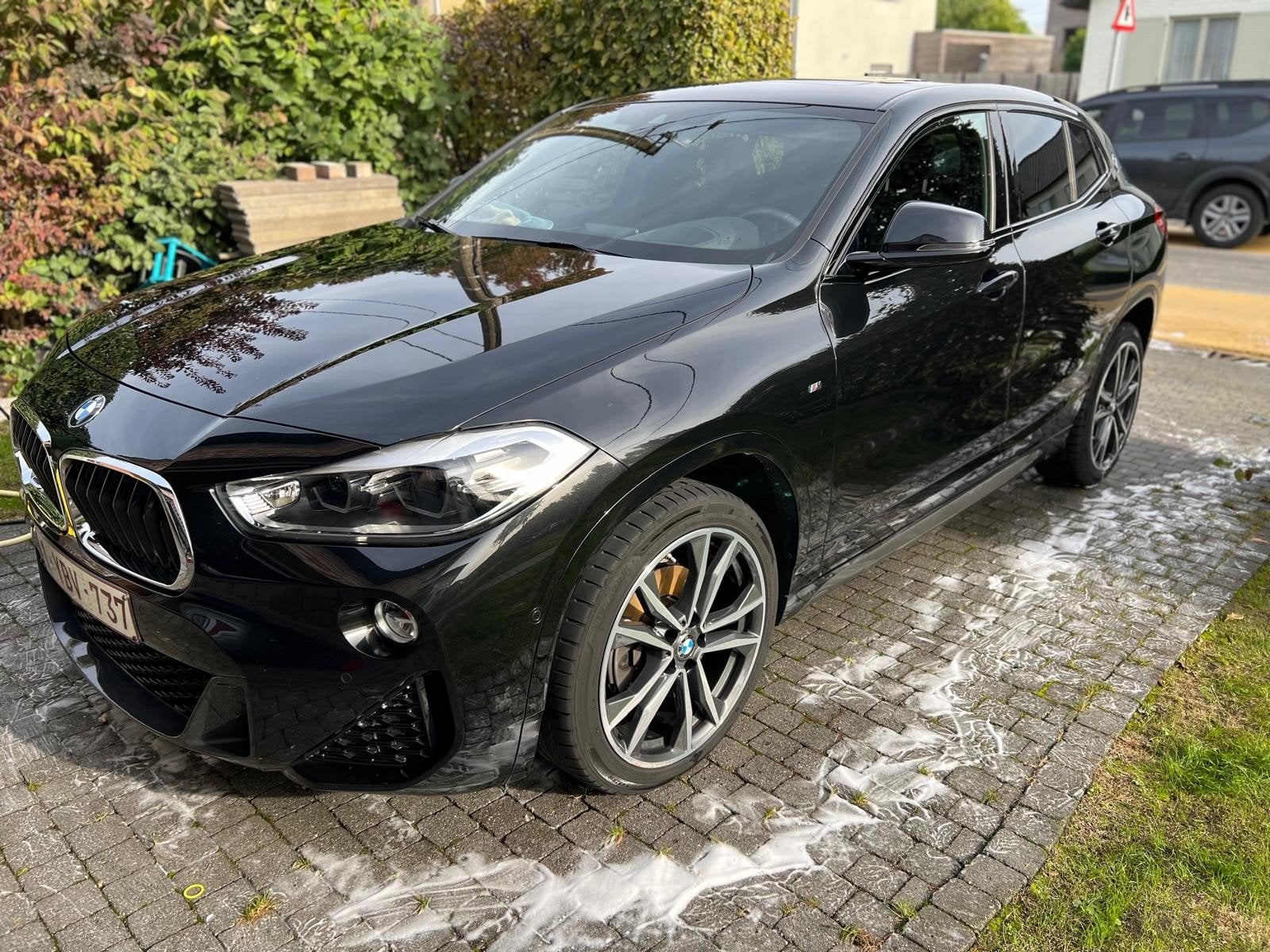 Te koop BMW  X2sDrive 18d, Auto's, X2, 1995 cc, Zwart, Leder