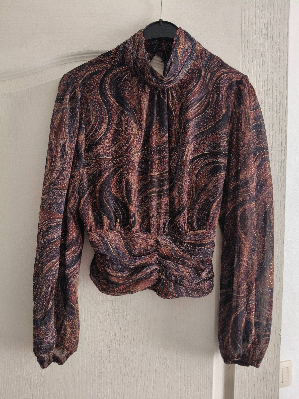 Blouse femme, Ophalen