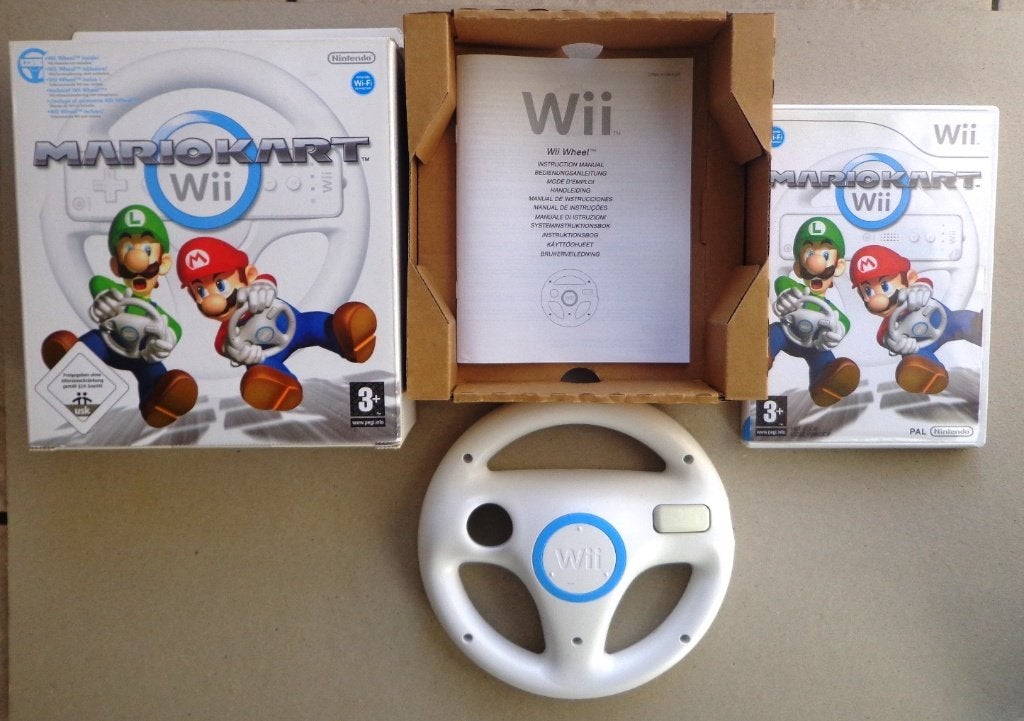 Mario Kart + origineel stuurtje voor Wii Compleet in doos, Games en Spelcomputers, Games | Nintendo Wii, Zo goed als nieuw, Ophalen of Verzenden