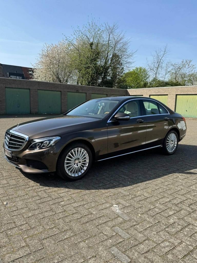 Merceds benz  C klasse 200  Km 65000, Auto's, Mercedes-Benz, Achterwielaandrijving, Bruin, Leder, Particulier