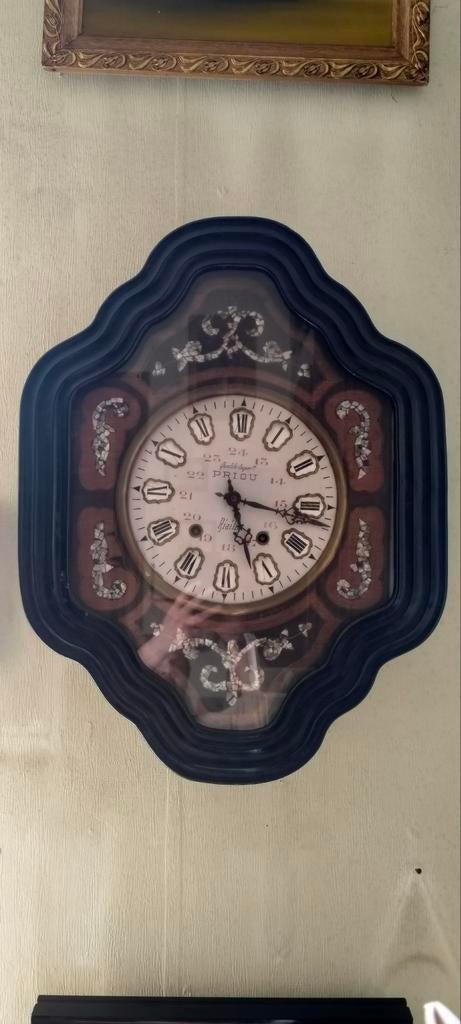 Wandklok 'oeil de boeuf', Ophalen